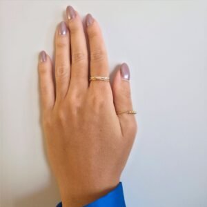 Anel torcido regulável